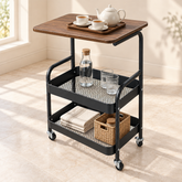 عربة تقديم بثلاثة مستويات وسطح بمظهر خشبي ورفوف سوداء وعجلات | Three-tier serving trolley with a wood-look top, black shelves, and wheels