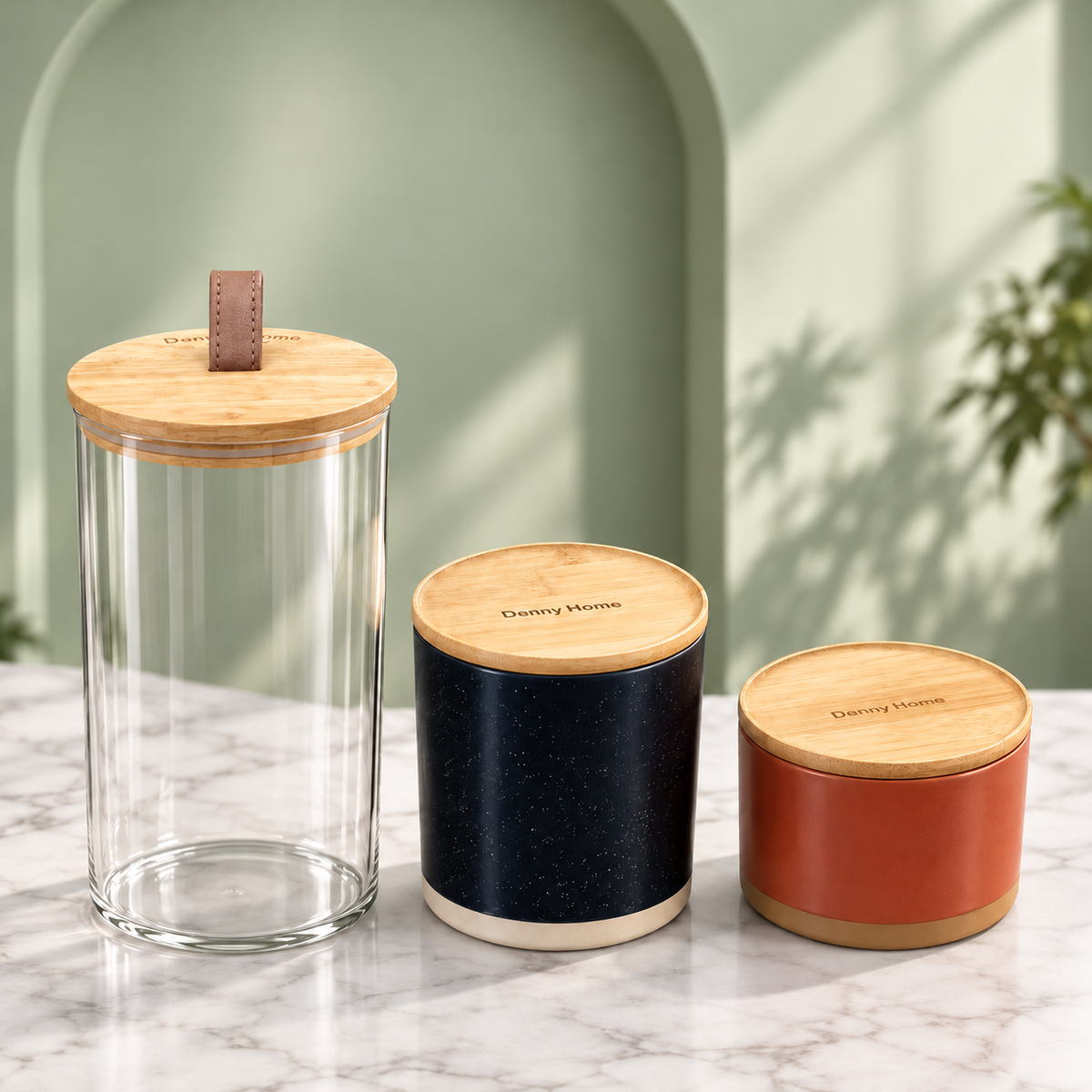 برطمانات تخزين شفافة وسوداء وطوبية بأغطية بمظهر خشبي | Transparent, black, and terracotta storage jars with wood-look lids